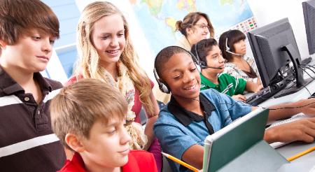 Students interacting with computers 
